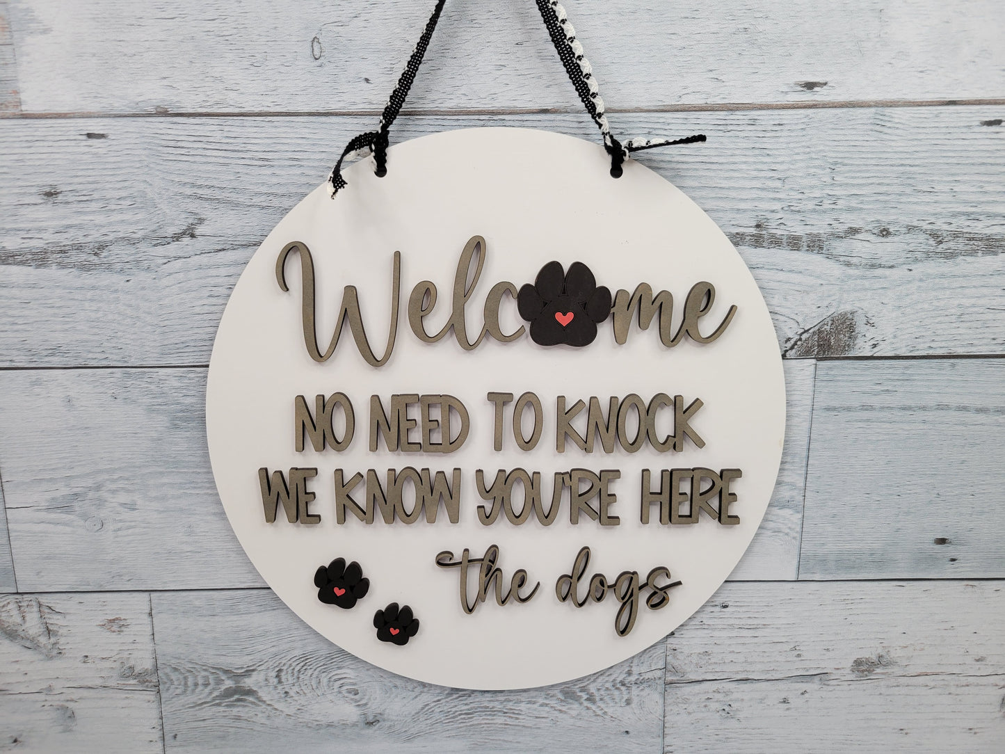 Welcome No need to knock. We know you're here. The Dogs. Door Hanger