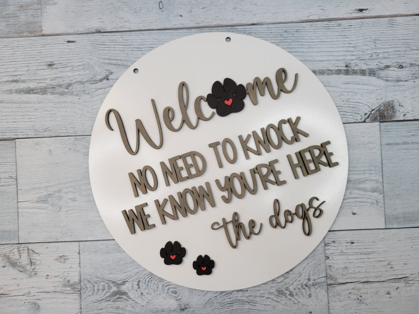 Welcome No need to knock. We know you're here. The Dogs. Door Hanger