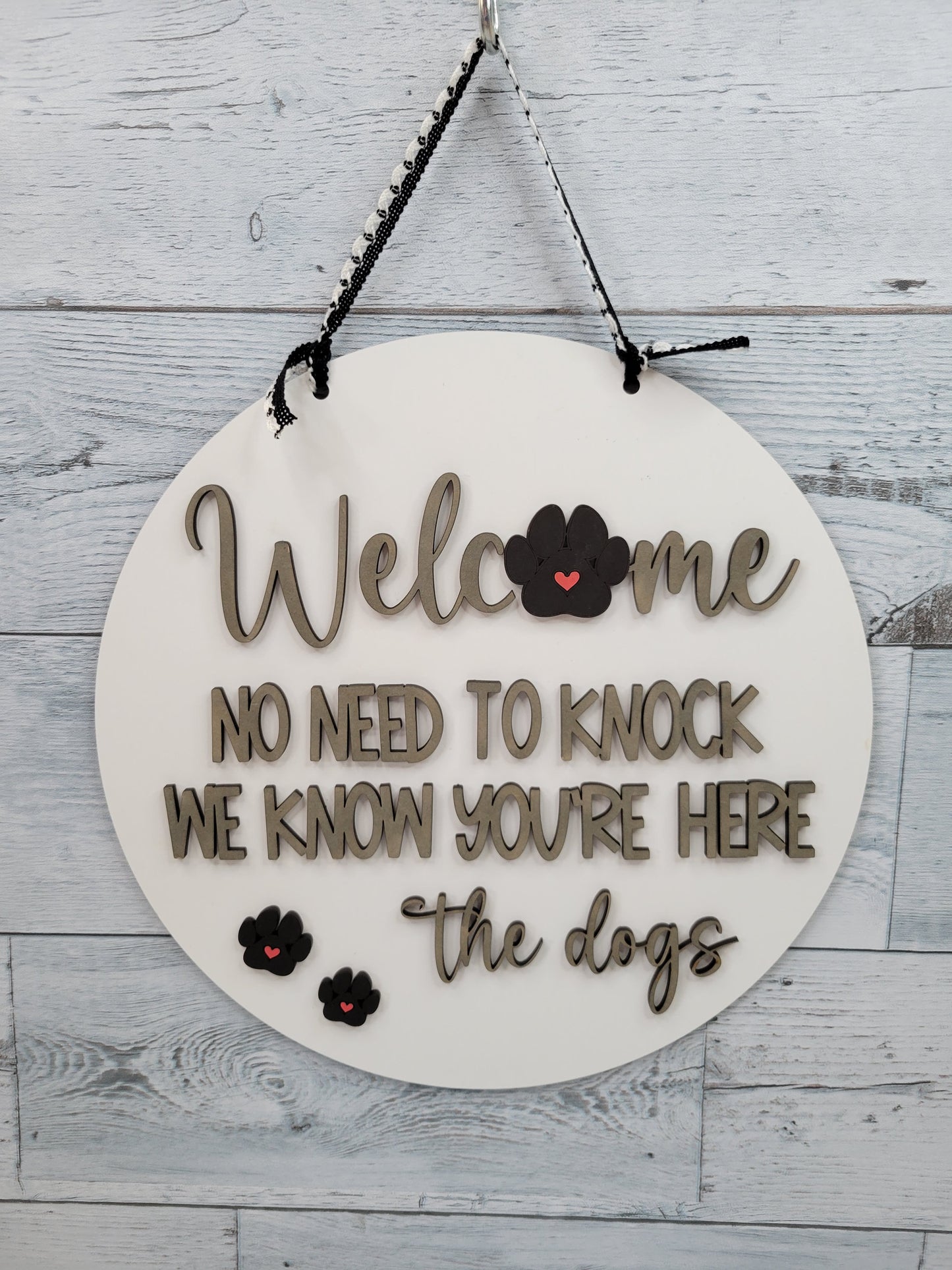 Welcome No need to knock. We know you're here. The Dogs. Door Hanger